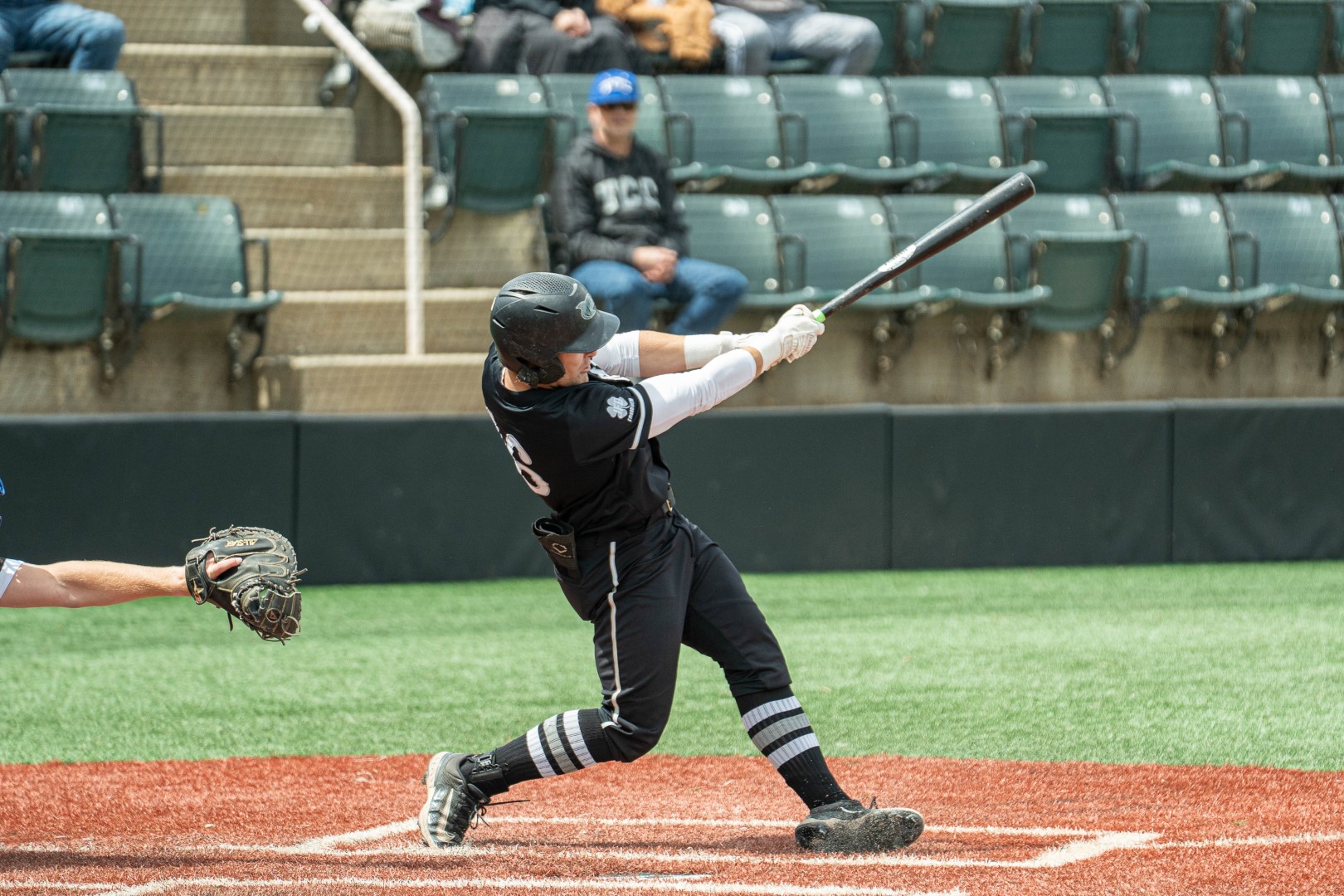 Shoreline batter swinging in front of the grandstand