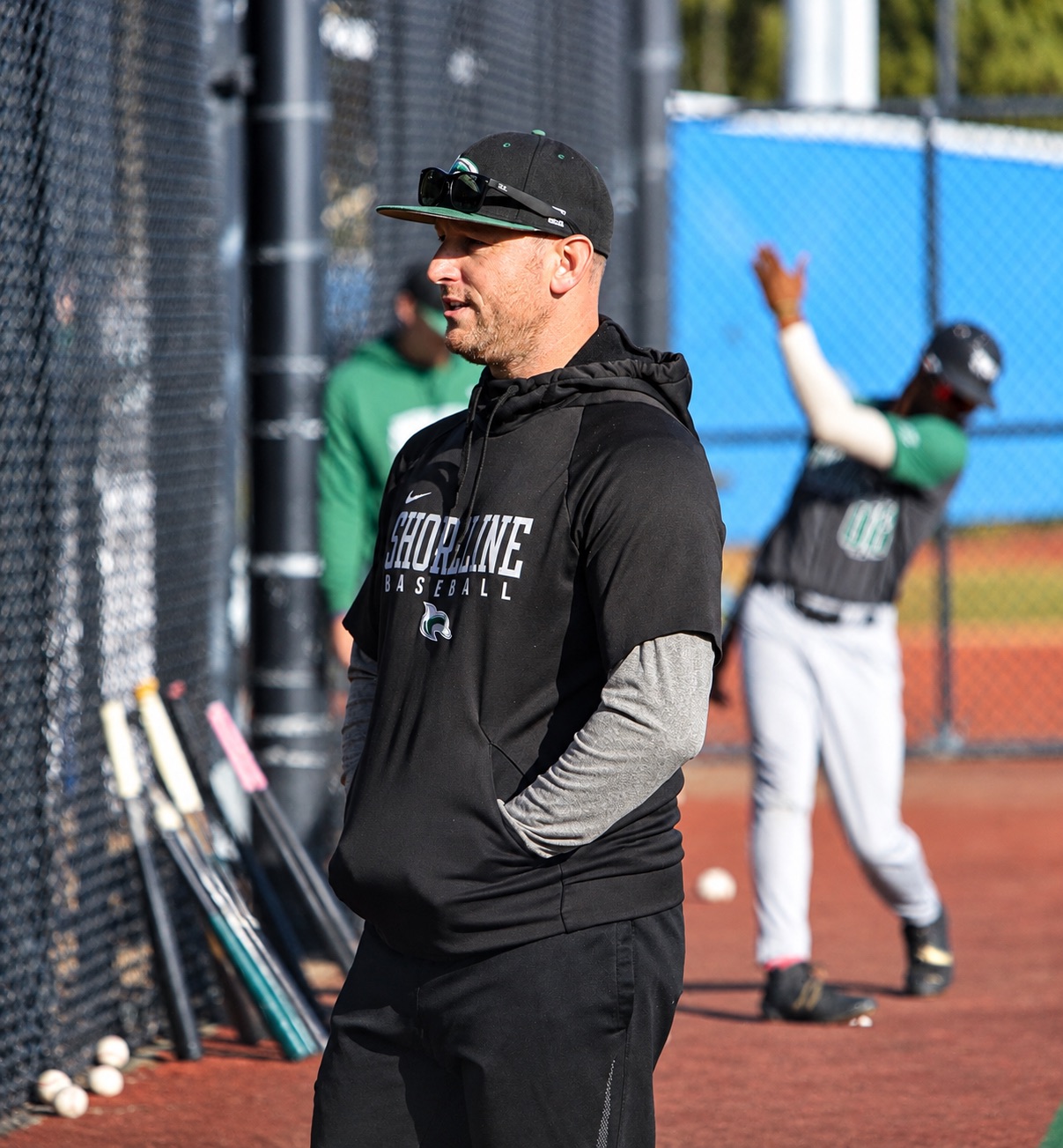 Brady Summers watching batting practice during a Shoreline Baseball workout