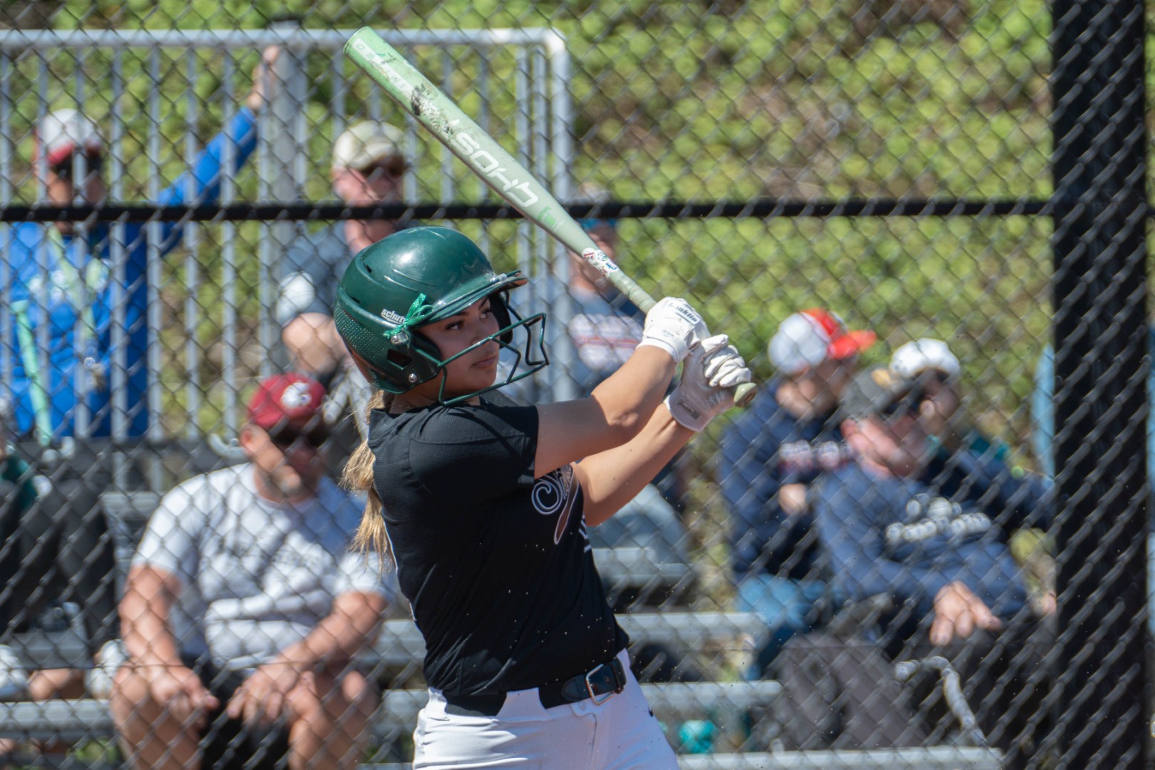 Shoreline softball batter watching the ball at the plate