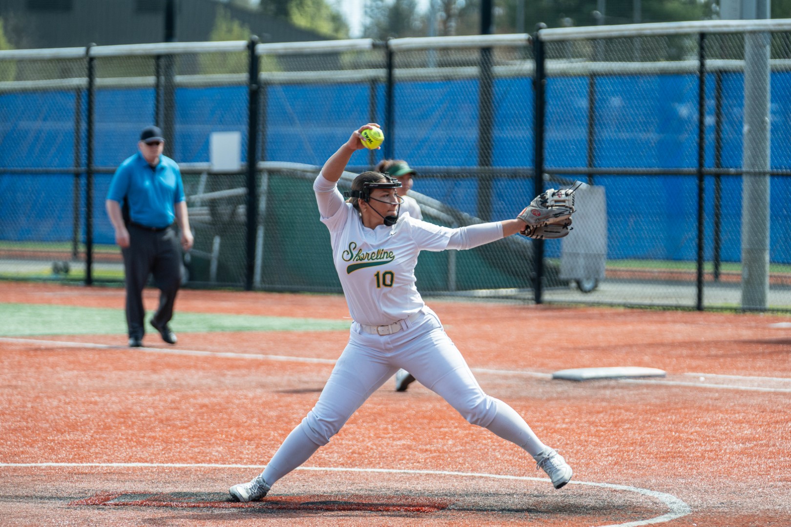 Shoreline softball pitcher in her windup delivering toward the plate